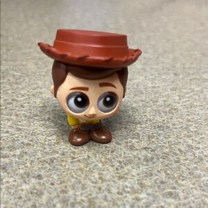 Toy Story Disney Doorables Woody Figure - Brown and Yellow